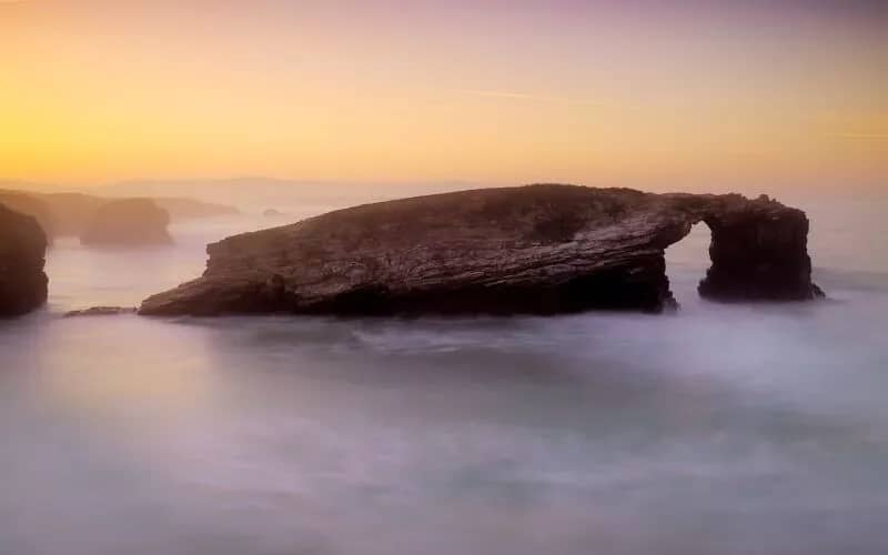 Huge rocks surrounded by fog