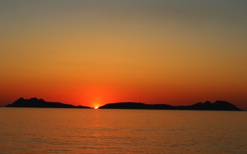 The sun setting over the islands