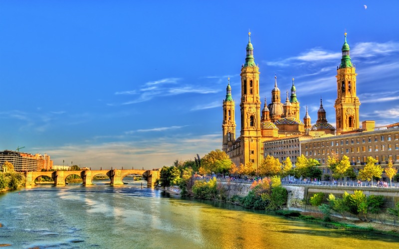 A river with an impressive church on one of its banks