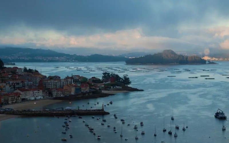 The Tambo Island as seen from the distance with a harbour in front