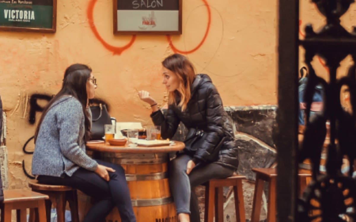 Two friends chatting casually.