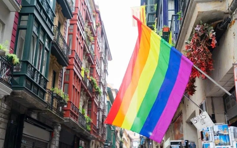 A rainbow flag in a typical Basque street
