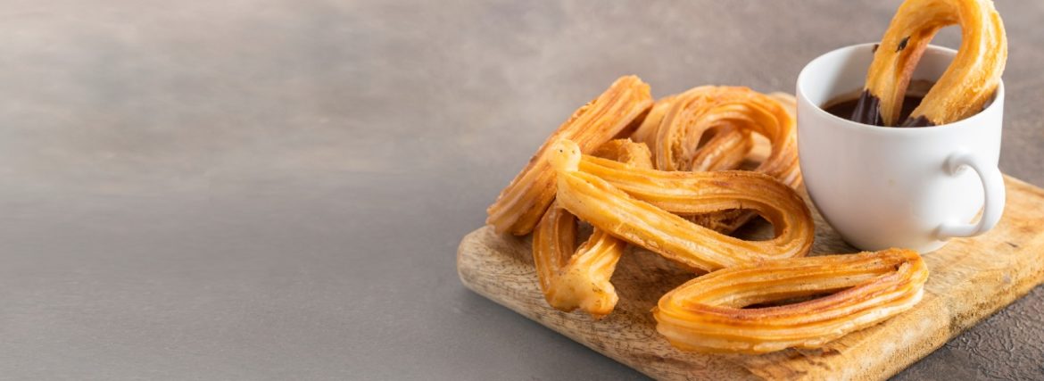 Churros with chocolate: the end point for Spanish parties