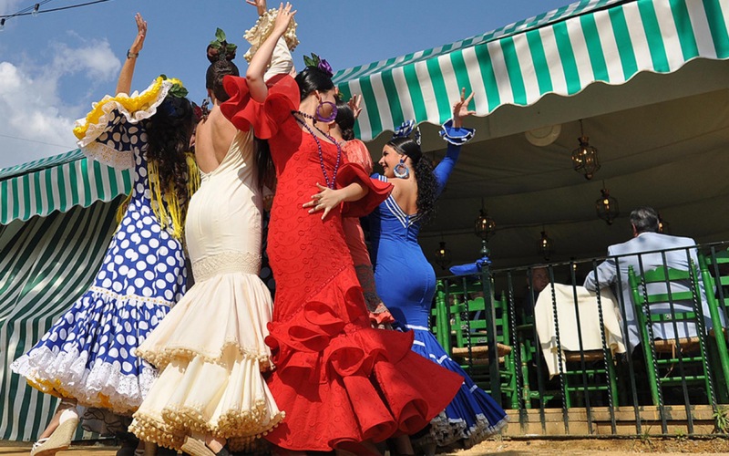 Girls dancing "sevillanas".