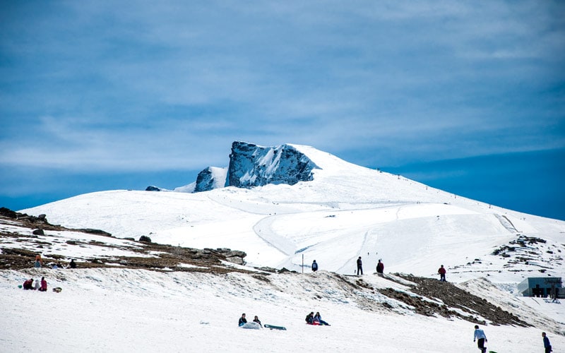 A mountain coverd in snow, one of the highest peaks in Spain